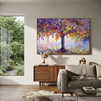 ARTWORK DETAILS Purple Crown Autumn Tree Painting is built from the actual artwork image: large purple and orange tree crown glowing over pastel ground. The composition uses raised texture to separate tree trunks, leaf masses, ground movement, and soft background atmosphere, so the surface reads with real hand-painted depth from different viewing angles. The color direction is blue, orange, yellow, chosen to keep the autumn mood warm while still leaving enough pale air and cool contrast for