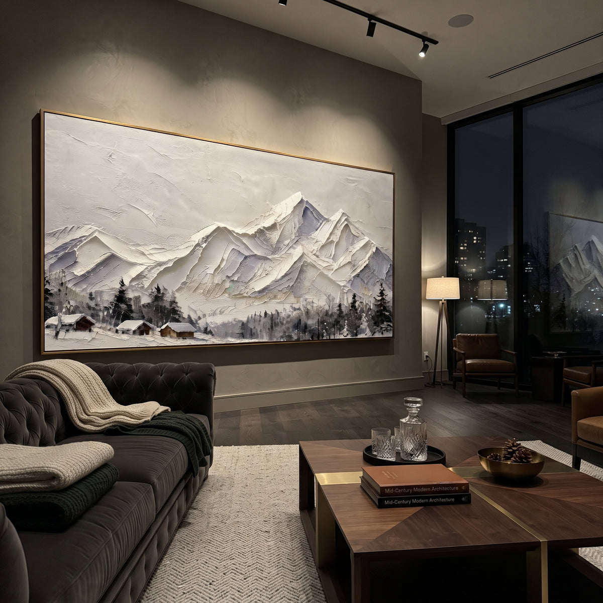 Folded White Summit Range is written from the actual artwork image, focusing on folded white summit range with crisp angular peaks and small dark cabins below. The visible composition is specific rather than generic: sharp folded ridges, pale beige sky, dark roof accents near the lower edge, and sculpted snow planes. The wide horizontal layout controls how the eye travels through the scene, with the mountain mass, valley floor, tree line, water edge, or small figure details arranged to create