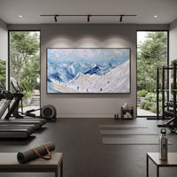 Sky Blue Ski Valley is written from the actual artwork image, focusing on sky blue ski valley with small red and dark skiers across rolling snow. The visible composition is specific rather than generic: open blue sky, rolling snow valley, tiny skiers in motion, and distant mountain layers. The wide horizontal layout controls how the eye travels through the scene, with the mountain mass, valley floor, tree line, water edge, or small figure details arranged to create depth across the canvas. Its