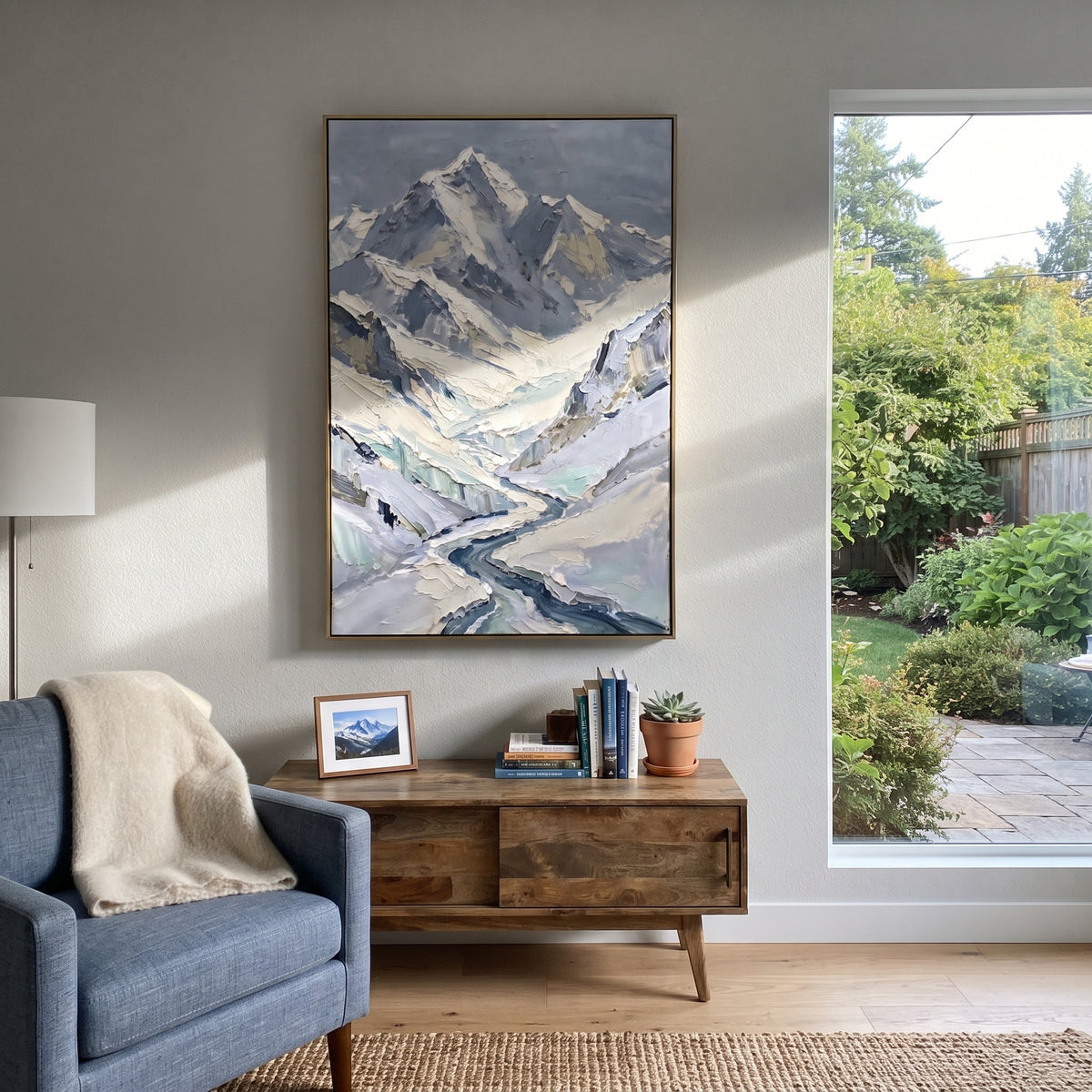 River Valley Snow Peak is written from the actual artwork image, focusing on river valley snow peak with turquoise shadows and a tall mountain above winding water. The visible composition is specific rather than generic: a vertical river valley, turquoise-blue snow shadows, and a tall faceted peak rising above. The tall vertical layout controls how the eye travels through the scene, with the mountain mass, valley floor, tree line, water edge, or small figure details arranged to create depth