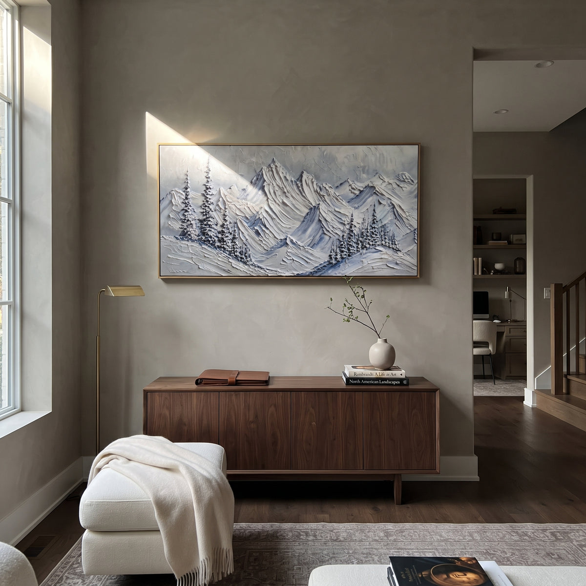 Blue Fir Mountain Range is written from the actual artwork image, focusing on blue fir mountain range with snow-dusted pines and icy ridge layers. The visible composition is specific rather than generic: snow-dusted pines, icy blue ridge layers, and a cool grey winter sky. The wide horizontal layout controls how the eye travels through the scene, with the mountain mass, valley floor, tree line, water edge, or small figure details arranged to create depth across the canvas. Its white, blue, gray