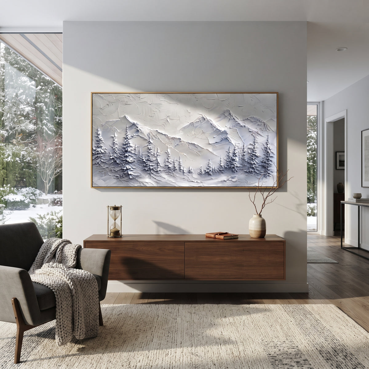 Misty Blue Forest Peaks is written from the actual artwork image, focusing on misty blue forest peaks with layered pines and soft distant snowy ridges. The visible composition is specific rather than generic: layered blue pines, distant snowy ridges, and misty winter air. The wide horizontal layout controls how the eye travels through the scene, with the mountain mass, valley floor, tree line, water edge, or small figure details arranged to create depth across the canvas. Its white, blue, gray