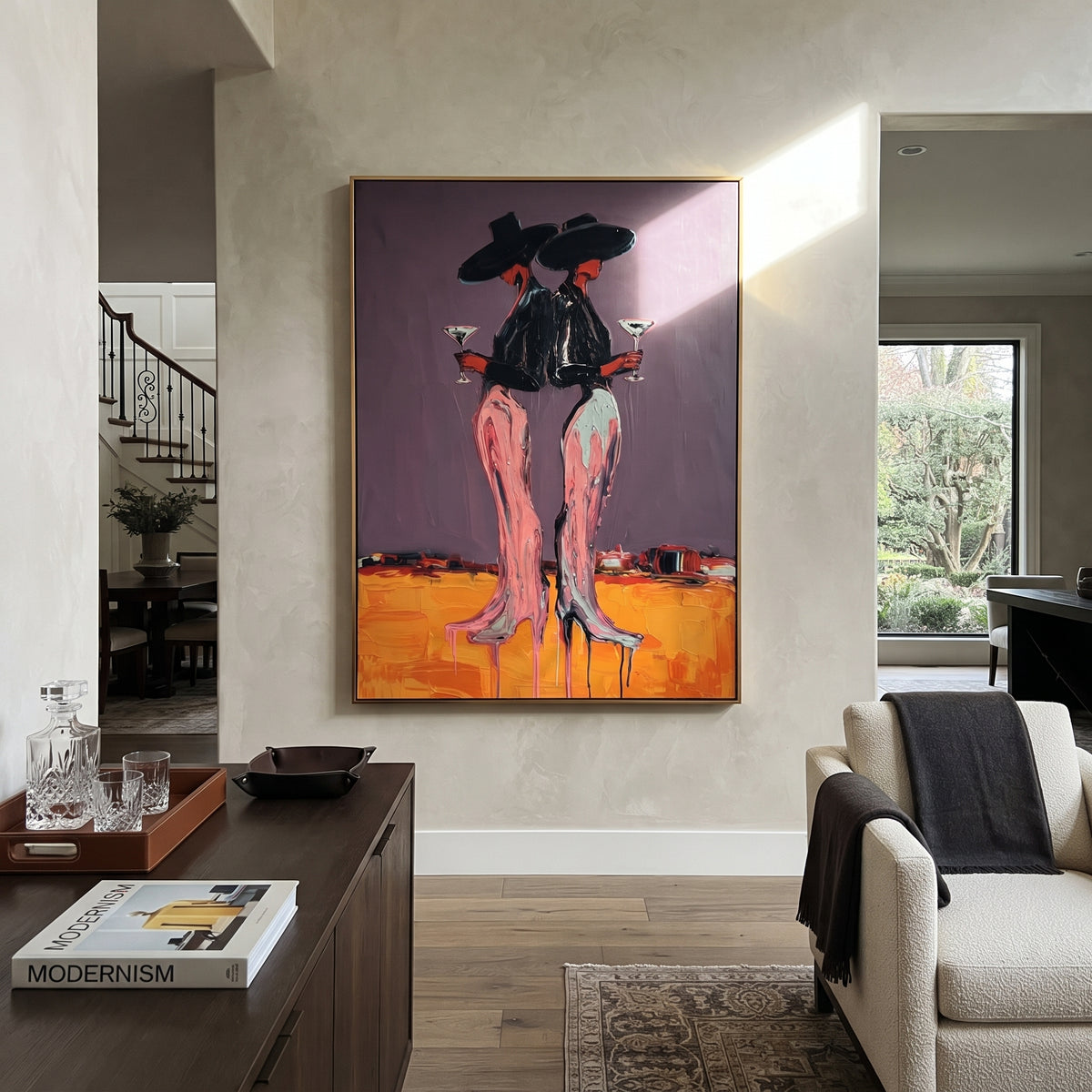 Neon Desert Cowgirls is written from the actual artwork image, focusing on two cowgirls in black hats standing close on an orange desert floor. The composition is built from specific visible details: paired black hats, pink legs, orange ground, purple wall, and cocktail-like stance. The vertical composition keeps attention on paired black hats, pink legs, orange ground, purple wall, and cocktail-like stance, using open ground, cropped edges, and strong color blocks to make the scene feel direct