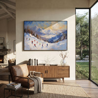 Pastel Valley Skiers focuses on small skiers crossing a pastel blue and orange valley beneath soft winter clouds. The artwork shows a winter ski scene built from the actual image: visible downhill figures, curved snow tracks, raised ridgelines, and alpine space arranged in a wide composition. The blue, orange, white palette gives the piece a cold mountain atmosphere while the thick impasto surface creates shadows along each snowbank, ski line, and textured ridge. This is presented as