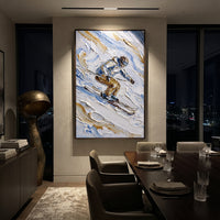 Ice Snow Trail focuses on soft gray snowfields broken by colorful skiers and thick ridge texture. The artwork shows a winter ski scene built from the actual image: visible downhill figures, curved snow tracks, raised ridgelines, and alpine space arranged in a tall composition. The blue, white, orange palette gives the piece a cold mountain atmosphere while the thick impasto surface creates shadows along each snowbank, ski line, and textured ridge. This is presented as hand-painted textured
