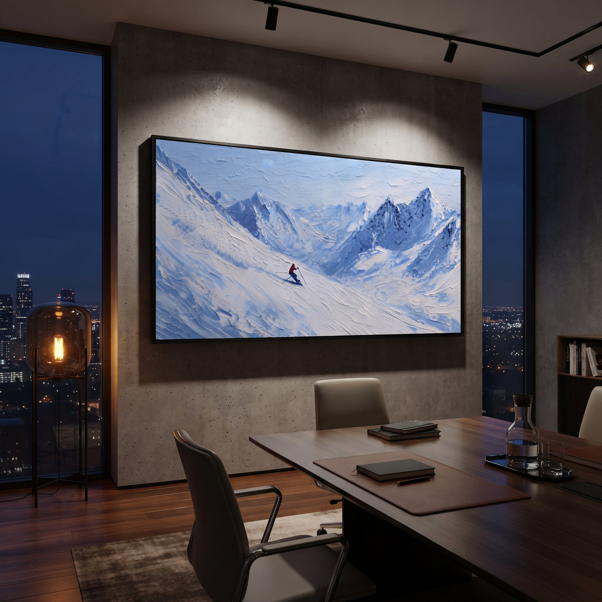 Mountain Ski Traverse focuses on small downhill figures moving over carved impasto snow channels and soft blue shadows. The artwork shows a winter ski scene built from the actual image: visible downhill figures, curved snow tracks, raised ridgelines, and alpine space arranged in a wide composition. The white, gray, blue palette gives the piece a cold mountain atmosphere while the thick impasto surface creates shadows along each snowbank, ski line, and textured ridge. This is presented as