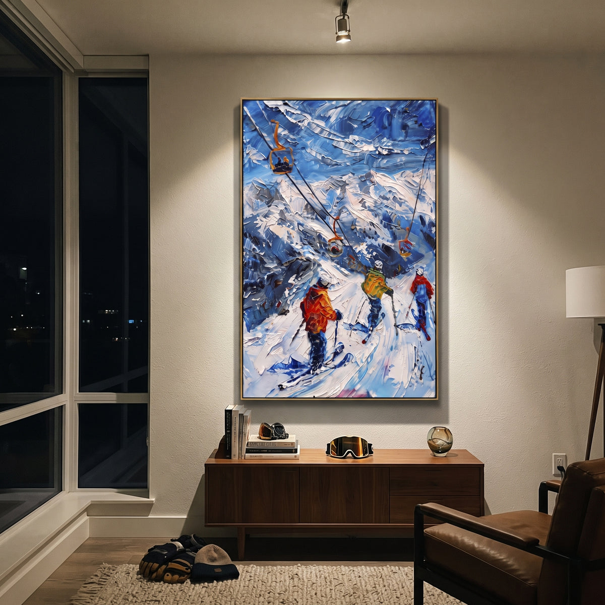 Chairlift Mountain Skiers focuses on orange ski lifts crossing a blue mountain slope with clustered skiers below. The artwork shows a winter ski scene built from the actual image: visible downhill figures, curved snow tracks, raised ridgelines, and alpine space arranged in a tall composition. The blue, white, orange palette gives the piece a cold mountain atmosphere while the thick impasto surface creates shadows along each snowbank, ski line, and textured ridge. This is presented as