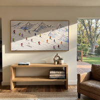 Glacier Pine Slope With Pine Shadows focuses on small downhill figures moving over carved impasto snow channels and soft blue shadows. The artwork shows a winter ski scene built from the actual image: visible downhill figures, curved snow tracks, raised ridgelines, and alpine space arranged in a wide composition. The white, black, gray palette gives the piece a cold mountain atmosphere while the thick impasto surface creates shadows along each snowbank, ski line, and textured ridge. This is