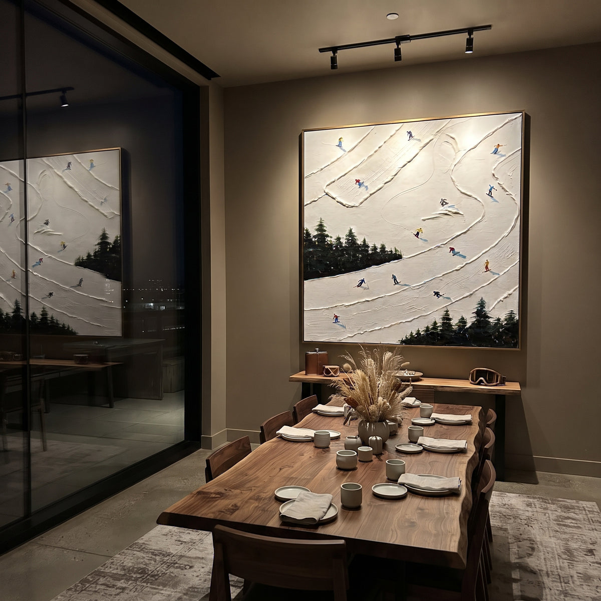 Birch Ski Valley focuses on a calm mountain basin with crisp tracks, snow shelves, and small skiers. The artwork shows a winter ski scene built from the actual image: visible downhill figures, curved snow tracks, raised ridgelines, and alpine space arranged in a balanced composition. The white, gray, blue palette gives the piece a cold mountain atmosphere while the thick impasto surface creates shadows along each snowbank, ski line, and textured ridge. This is presented as hand-painted textured
