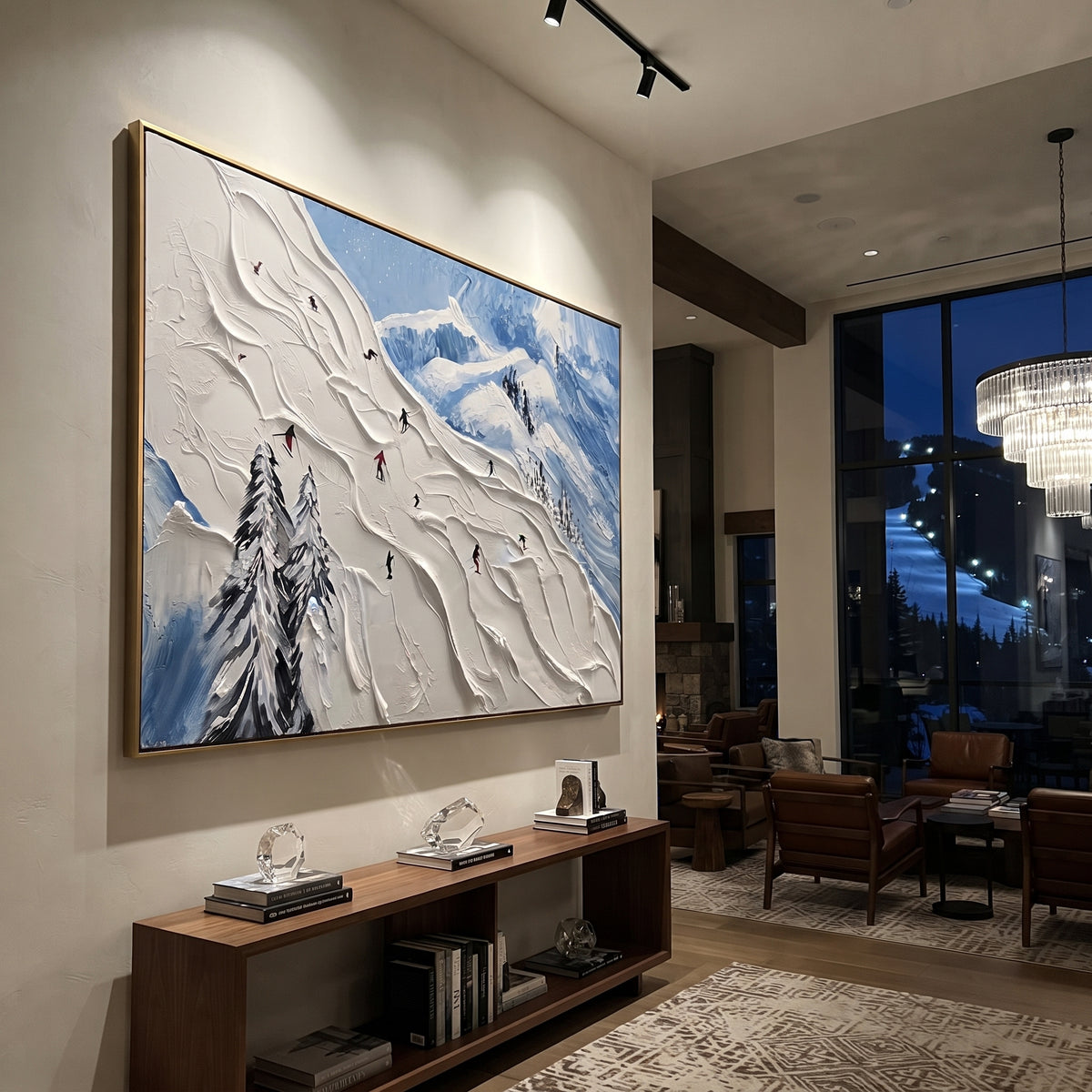Resort Mountain Run focuses on a calm mountain basin with crisp tracks, snow shelves, and small skiers. The artwork shows a winter ski scene built from the actual image: visible downhill figures, curved snow tracks, raised ridgelines, and alpine space arranged in a wide composition. The white, gray, blue palette gives the piece a cold mountain atmosphere while the thick impasto surface creates shadows along each snowbank, ski line, and textured ridge. This is presented as hand-painted textured