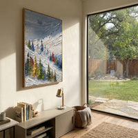 Highland Pine Slope With Pine Shadows focuses on layered snow ridges, visible ski marks, and a quiet pine border. The artwork shows a winter ski scene built from the actual image: visible downhill figures, curved snow tracks, raised ridgelines, and alpine space arranged in a tall composition. The blue, white, orange palette gives the piece a cold mountain atmosphere while the thick impasto surface creates shadows along each snowbank, ski line, and textured ridge. This is presented as