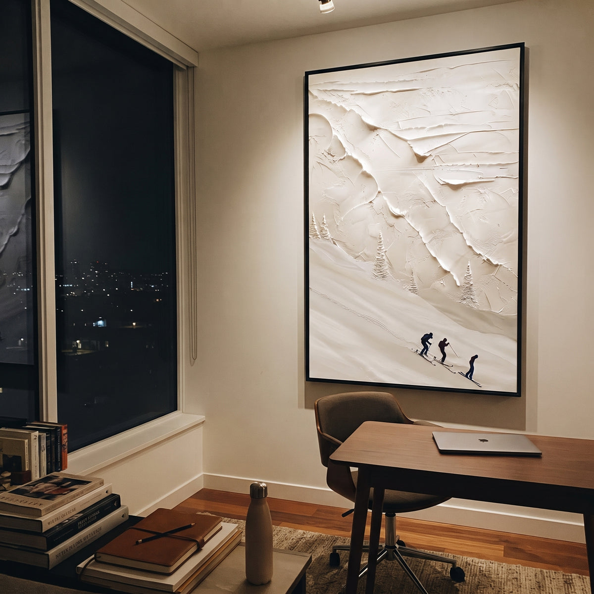 Peak Snow Basin With Pine Shadows focuses on layered snow ridges, visible ski marks, and a quiet pine border. The artwork shows a winter ski scene built from the actual image: visible downhill figures, curved snow tracks, raised ridgelines, and alpine space arranged in a tall composition. The white, black, gray palette gives the piece a cold mountain atmosphere while the thick impasto surface creates shadows along each snowbank, ski line, and textured ridge. This is presented as hand-painted