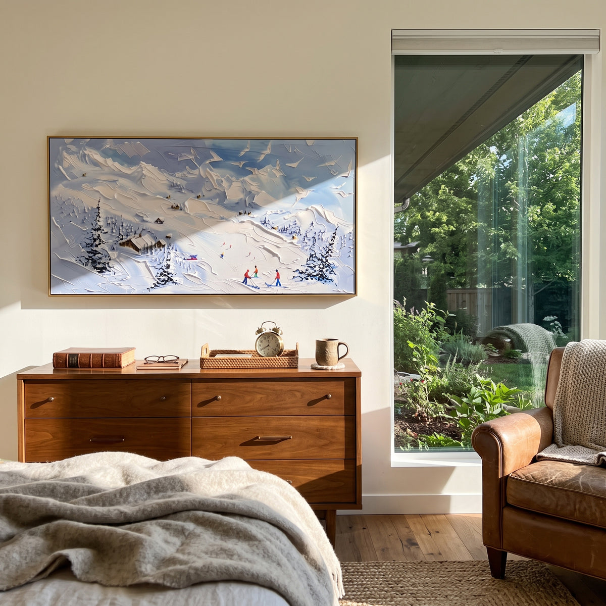Blue Cliff Ski Lodge focuses on tiny skiers and a small lodge set beneath a raised blue cliff and snowy pines. The artwork shows a winter ski scene built from the actual image: visible downhill figures, curved snow tracks, raised ridgelines, and alpine space arranged in a wide composition. The blue, white, beige palette gives the piece a cold mountain atmosphere while the thick impasto surface creates shadows along each snowbank, ski line, and textured ridge. This is presented as hand-painted