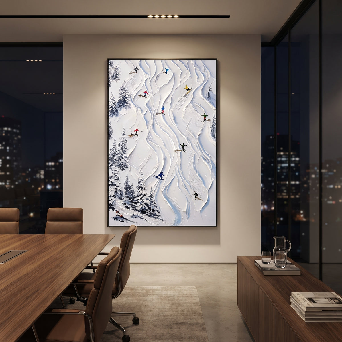 Alpine Pine Slope focuses on distant peaks, white powder banks, and raised palette-knife terrain. The artwork shows a winter ski scene built from the actual image: visible downhill figures, curved snow tracks, raised ridgelines, and alpine space arranged in a tall composition. The blue, white, orange palette gives the piece a cold mountain atmosphere while the thick impasto surface creates shadows along each snowbank, ski line, and textured ridge. This is presented as hand-painted textured