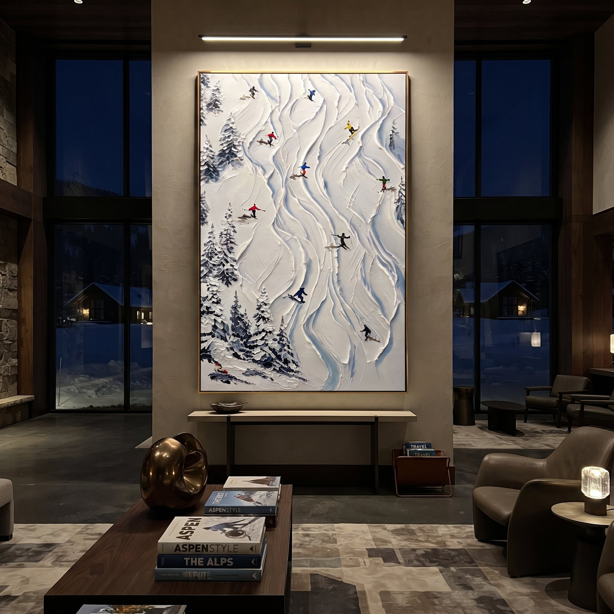 Alpine Pine Slope focuses on distant peaks, white powder banks, and raised palette-knife terrain. The artwork shows a winter ski scene built from the actual image: visible downhill figures, curved snow tracks, raised ridgelines, and alpine space arranged in a tall composition. The blue, white, orange palette gives the piece a cold mountain atmosphere while the thick impasto surface creates shadows along each snowbank, ski line, and textured ridge. This is presented as hand-painted textured