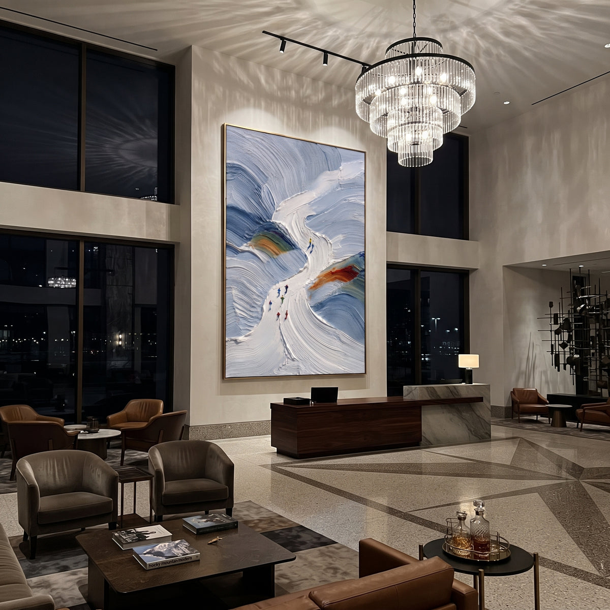 Blue Chute Ski Valley focuses on small skiers following a narrow white chute through blue sculpted snow walls. The artwork shows a winter ski scene built from the actual image: visible downhill figures, curved snow tracks, raised ridgelines, and alpine space arranged in a tall composition. The blue, white, orange palette gives the piece a cold mountain atmosphere while the thick impasto surface creates shadows along each snowbank, ski line, and textured ridge. This is presented as hand-painted