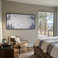 Resort Mountain Run With Blue Tracks focuses on a calm mountain basin with crisp tracks, snow shelves, and small skiers. The artwork shows a winter ski scene built from the actual image: visible downhill figures, curved snow tracks, raised ridgelines, and alpine space arranged in a wide composition. The blue, white, orange palette gives the piece a cold mountain atmosphere while the thick impasto surface creates shadows along each snowbank, ski line, and textured ridge. This is presented as