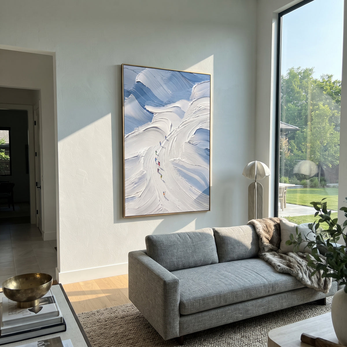 Pine Texture Run With Blue Tracks focuses on a calm mountain basin with crisp tracks, snow shelves, and small skiers. The artwork shows a winter ski scene built from the actual image: visible downhill figures, curved snow tracks, raised ridgelines, and alpine space arranged in a tall composition. The white, gray, blue palette gives the piece a cold mountain atmosphere while the thick impasto surface creates shadows along each snowbank, ski line, and textured ridge. This is presented as