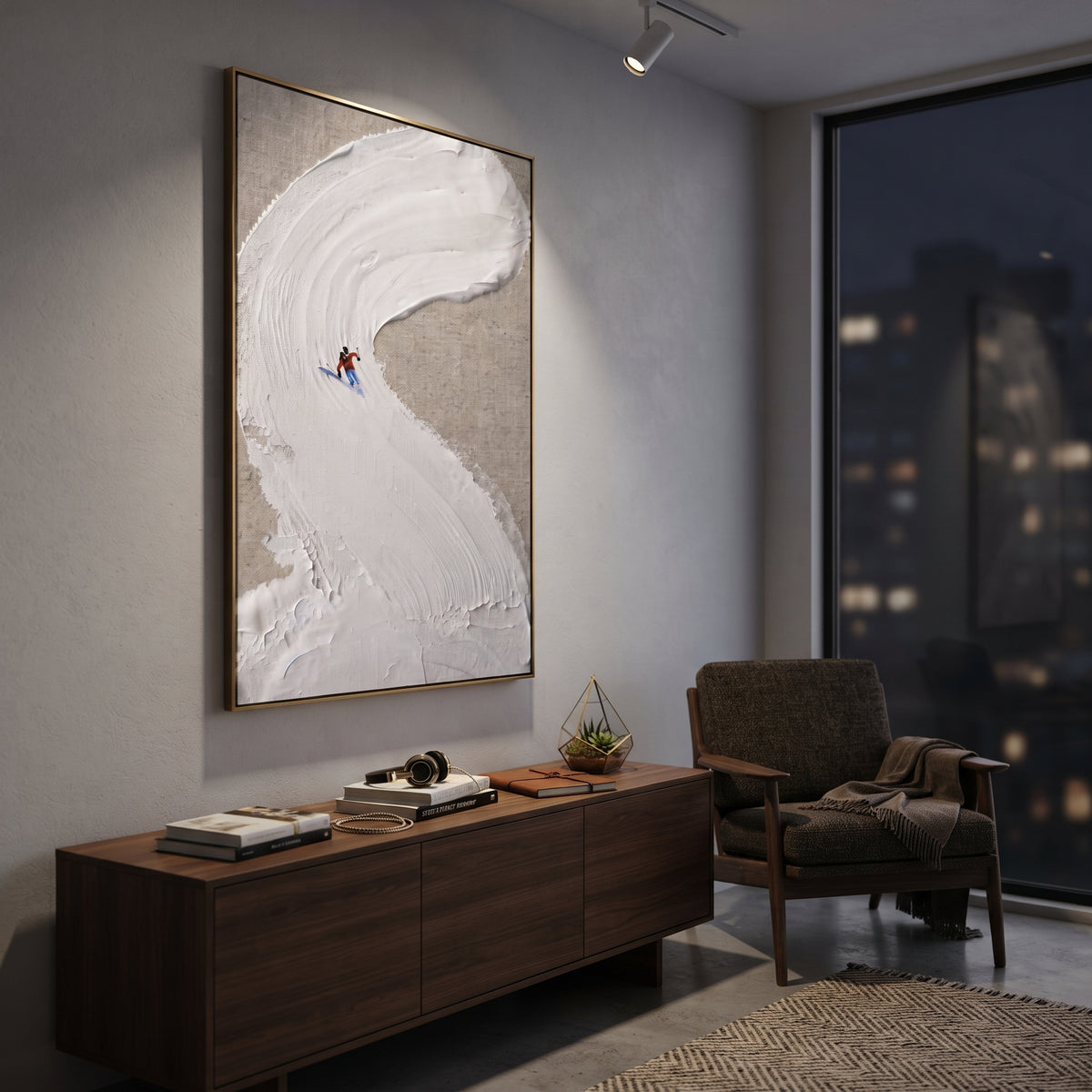 Curved Snowbank Skiers focuses on two tiny skiers tucked against a sweeping sculpted snowbank on taupe ground. The artwork shows a winter ski scene built from the actual image: visible downhill figures, curved snow tracks, raised ridgelines, and alpine space arranged in a tall composition. The white, gray, red palette gives the piece a cold mountain atmosphere while the thick impasto surface creates shadows along each snowbank, ski line, and textured ridge. This is presented as hand-painted