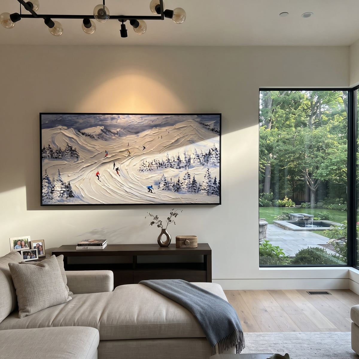 Fresh Alpine Descent focuses on colored skiers crossing raised white snow tracks between dark pine edges. The artwork shows a winter ski scene built from the actual image: visible downhill figures, curved snow tracks, raised ridgelines, and alpine space arranged in a wide composition. The white, green, blue palette gives the piece a cold mountain atmosphere while the thick impasto surface creates shadows along each snowbank, ski line, and textured ridge. This is presented as hand-painted