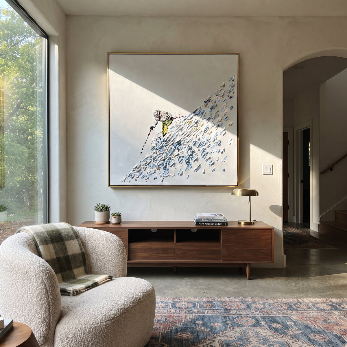 Steep Ice Chute Skier focuses on a lone skier descending a steep diagonal field of blue ice chips. The artwork shows a winter ski scene built from the actual image: visible downhill figures, curved snow tracks, raised ridgelines, and alpine space arranged in a balanced composition. The blue, white, gray palette gives the piece a cold mountain atmosphere while the thick impasto surface creates shadows along each snowbank, ski line, and textured ridge. This is presented as hand-painted textured