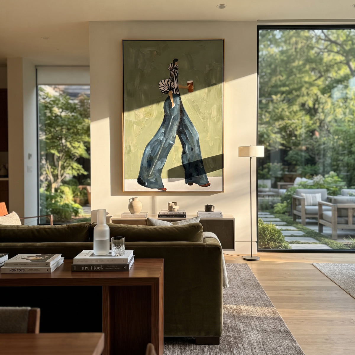 Blue Trousers Coffee Walk focuses on the specific fashion figure shown in the artwork: side-walking woman in zebra striped sleeves and flowing blue trousers holding a coffee cup. The image is built around elongated trousers, a compact upper-body pose, sculptural sleeve volume, small accessory detail, and a quiet studio background. The blue, beige, green palette keeps the mood refined while the raised texture and visible brushwork make the surface feel handmade rather than printed. This