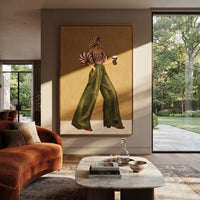 Red Stripe Green Pants Back focuses on the specific fashion figure shown in the artwork: back-view woman with red striped puff blouse, green trousers, and striped headscarf. The image is built around elongated trousers, a compact upper-body pose, sculptural sleeve volume, small accessory detail, and a quiet studio background. The green, red, yellow palette keeps the mood refined while the raised texture and visible brushwork make the surface feel handmade rather than printed. This made-to-order