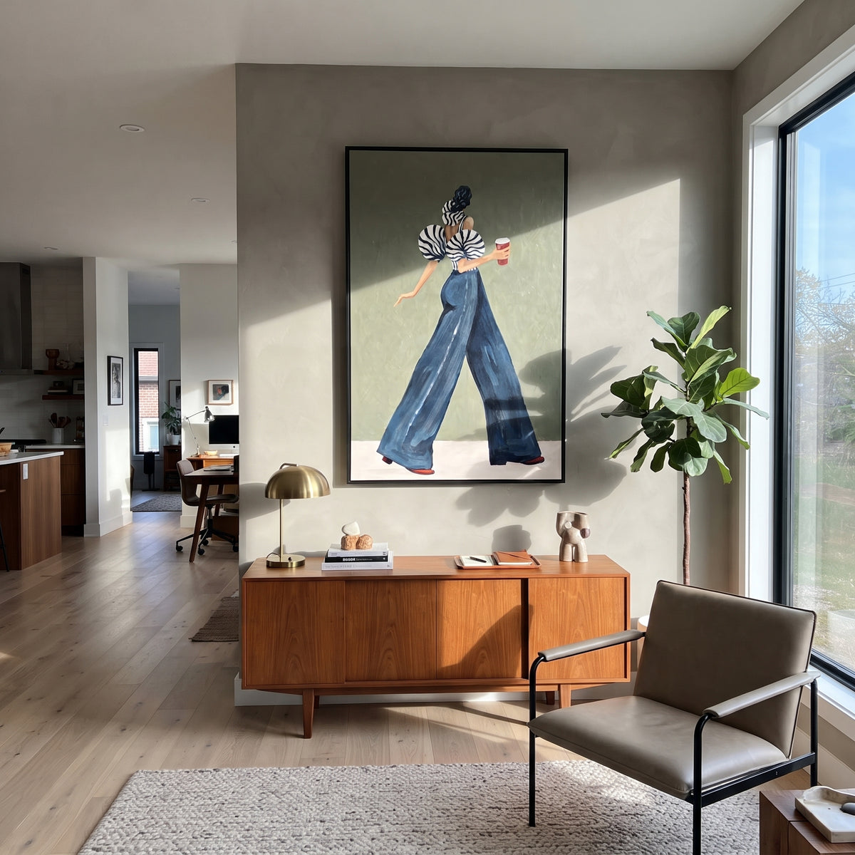 Blue Trouser Coffee Turn focuses on the specific fashion figure shown in the artwork: walking back-profile woman in blue trousers carrying a red coffee cup. The image is built around elongated trousers, a compact upper-body pose, sculptural sleeve volume, small accessory detail, and a quiet studio background. The blue, beige, green palette keeps the mood refined while the raised texture and visible brushwork make the surface feel handmade rather than printed. This made-to-order canvas suits