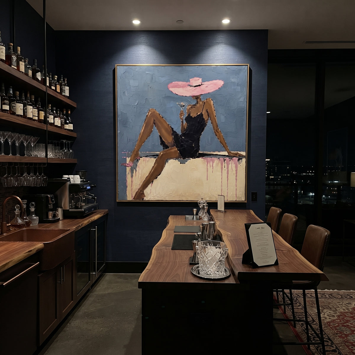 Pink Hat Blue Lounge Figure focuses on seated woman in black dress with long legs, pink wide hat, blue wall, pale sofa ledge, and pink drip marks. The composition is built from the exact pose, clothing shape, accessories, furniture, animal form, shoreline, palm shape, surfboard, or table arrangement visible in this artwork, so the image reads as a specific modern figurative painting rather than a generic decorative abstract. The blue; pink; black palette gives the piece its main atmosphere