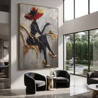 Black Dress Gold Cafe Chair focuses on seated black-dressed woman with red hat at gold cafe chair and small round table. The composition is built from the exact pose, clothing shape, accessories, furniture, animal form, shoreline, palm shape, surfboard, or table arrangement visible in this artwork, so the image reads as a specific modern figurative painting rather than a generic decorative abstract. The black; gold; grey palette gives the piece its main atmosphere, while smaller dark and light