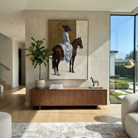 Blue Dress Rear Horse Wall focuses on blue dress rear horse wall with pale blue dress, broad black hat, brown horse body, reins, shadows, and cream studio ground. The composition is built from the exact pose, clothing shape, accessories, furniture, animal form, shoreline, palm shape, surfboard, or table arrangement visible in this artwork, so the image reads as a specific modern figurative painting rather than a generic decorative abstract. The blue; brown; cream palette gives the piece its main