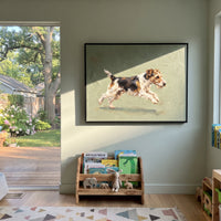 Luminous Playful Running Spaniel focuses on a lively spaniel captured mid-stride with a lifted tail. The composition keeps the principal subject clearly separated from the painted field, so the eye can follow the specific gesture, silhouette, garment, fur, petal, ridge, or river visible in this artwork. Its color relationships move between orange, pink, and green, with lighter passages opening the focal area and deeper strokes giving the forms weight. Palette-knife edges, impasto ridges, broken
