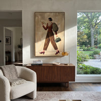 Restful Still Wide-Legged Fashion Figure focuses on a stylized fashion figure in dramatic trousers, blouse, or patterned coat. The composition keeps the principal subject clearly separated from the painted field, so the eye can follow the specific gesture, silhouette, garment, fur, petal, ridge, or river visible in this artwork. Its color relationships move between green, grey, and pink, with lighter passages opening the focal area and deeper strokes giving the forms weight. Palette-knife edges